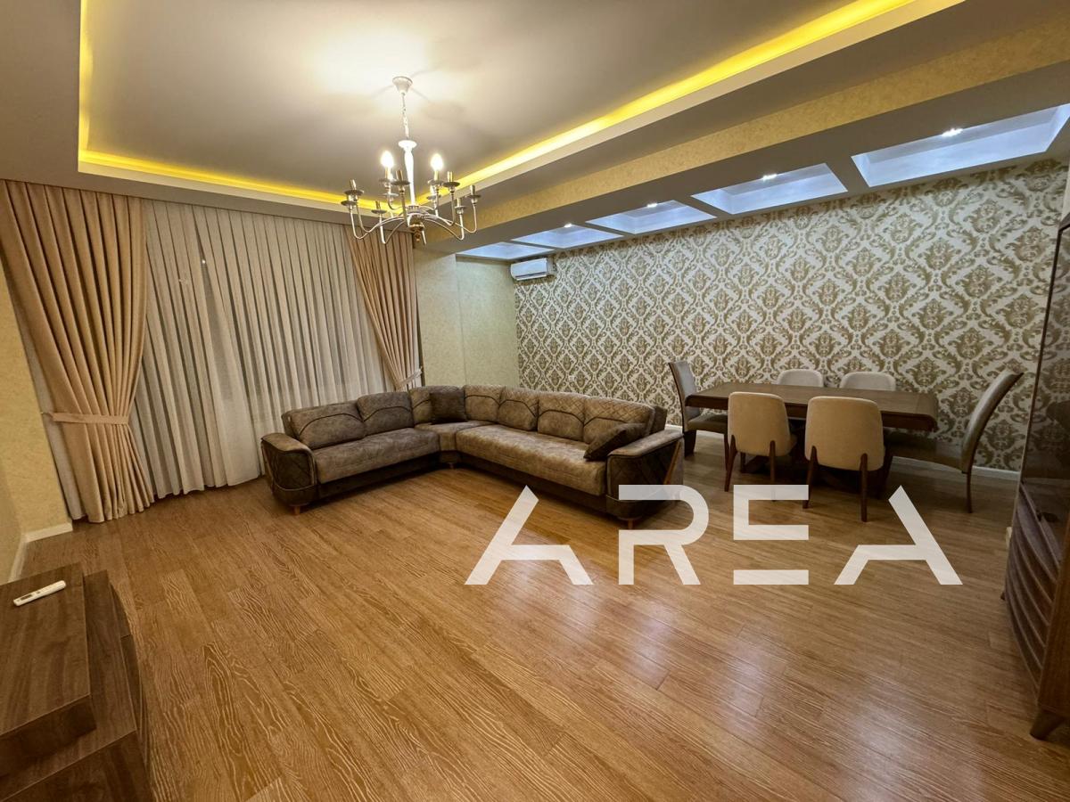 A 3-bedroom apartment is for sale near the Neftchilar hospital